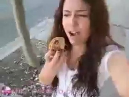   (271) - Miley Cyrus filming herself eating a big cookie - Captures