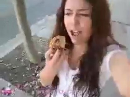   (273) - Miley Cyrus filming herself eating a big cookie - Captures