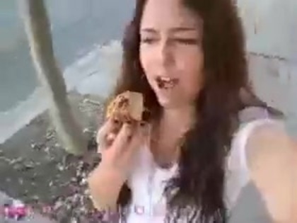   (274) - Miley Cyrus filming herself eating a big cookie - Captures