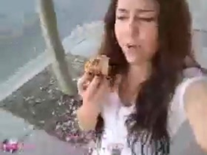   (277) - Miley Cyrus filming herself eating a big cookie - Captures
