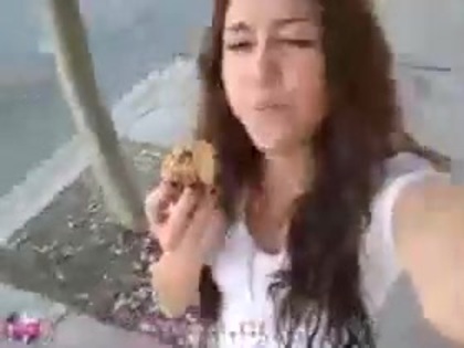   (279) - Miley Cyrus filming herself eating a big cookie - Captures
