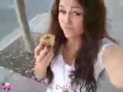   (285) - Miley Cyrus filming herself eating a big cookie - Captures