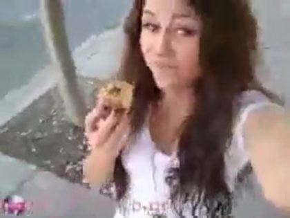   (286) - Miley Cyrus filming herself eating a big cookie - Captures