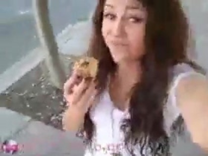   (287) - Miley Cyrus filming herself eating a big cookie - Captures