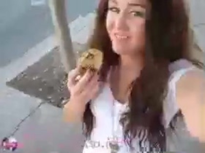   (291) - Miley Cyrus filming herself eating a big cookie - Captures