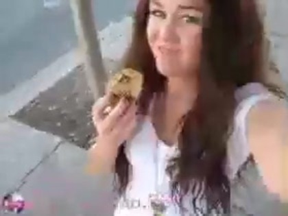   (292) - Miley Cyrus filming herself eating a big cookie - Captures