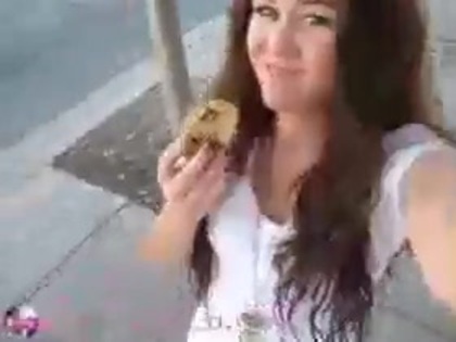   (295) - Miley Cyrus filming herself eating a big cookie - Captures