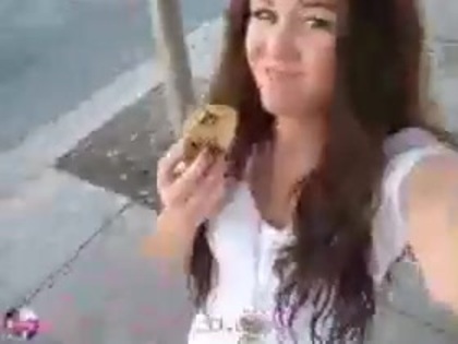   (296) - Miley Cyrus filming herself eating a big cookie - Captures