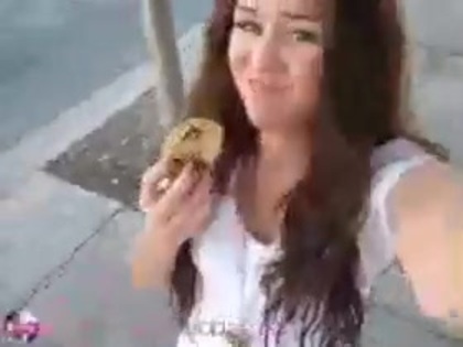   (298) - Miley Cyrus filming herself eating a big cookie - Captures
