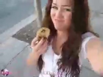   (301) - Miley Cyrus filming herself eating a big cookie - Captures