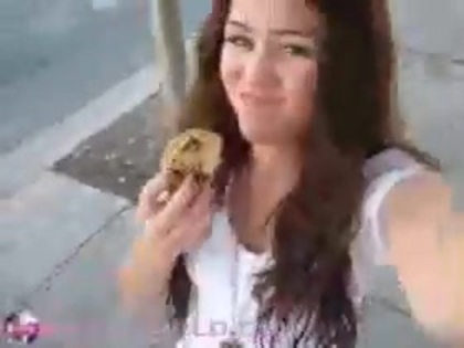   (302) - Miley Cyrus filming herself eating a big cookie - Captures