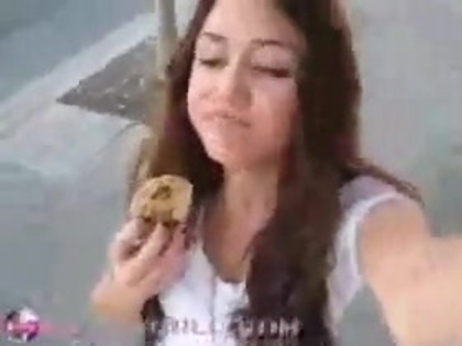   (330) - Miley Cyrus filming herself eating a big cookie - Captures