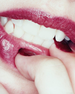 962d5f29b946b092_a-lipstick-and-matching-nails-getty-