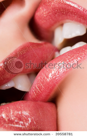 stock-photo-beautiful-female-lovers-kissing-closeup-39558781 - Buze