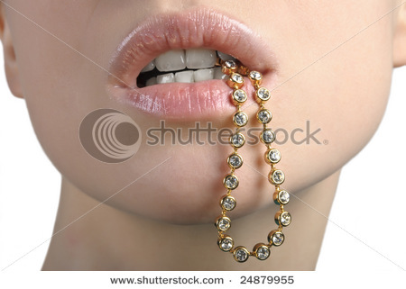 stock-photo-closeup-of-young-woman-holding-golden-bracelet-in-her-mouth-24879955 - Buze