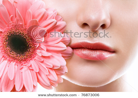 stock-photo-lips-with-pink-flower-76873006