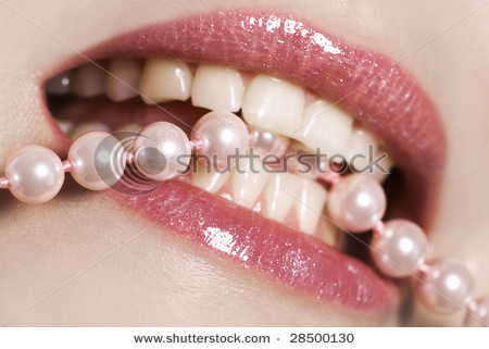stock-photo-sparkling-lips-white-teeth-and-pink-pearls-28500130