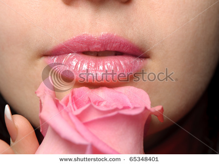 stock-photo-the-woman-with-a-rose-a-photo-close-up-parts-of-the-person-and-a-flower-65348401 - Buze1