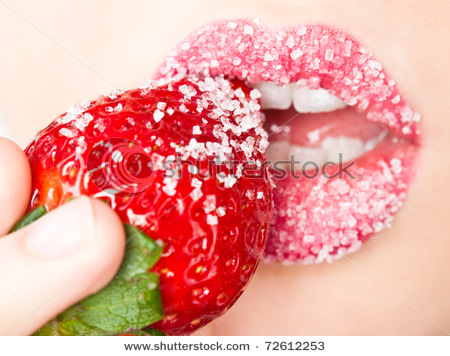 stock-photo-young-woman-s-mouth-with-red-strawberry-covered-with-sugar-72612253