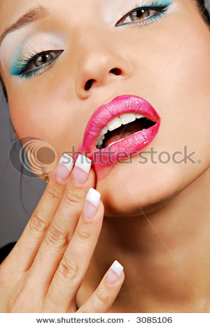 stock-photo-glamour-pink-gloss-lips-with-temptation-gesture-3085106