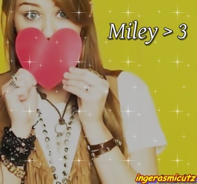0090070623 - mileyblogpozeglittery