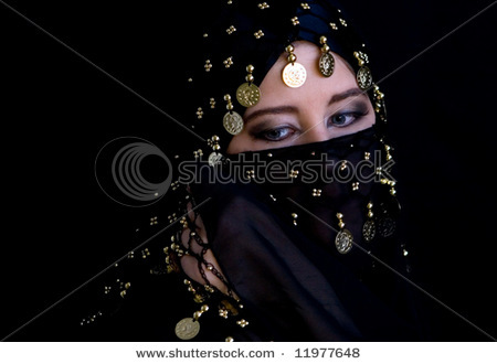 stock-photo-mysterious-eastern-woman-in-black-veil-11977648