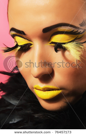 stock-photo-closeup-portrait-of-a-gorgeous-woman-with-bright-makeup-76457173