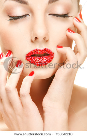 stock-photo-closeup-portrait-of-a-lovely-young-woman-touching-her-face-with-crystals-on-the-lips-753