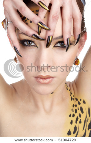 stock-photo-close-up-portrait-of-beautiful-young-european-model-in-cat-make-up-and-bodyart-51004729