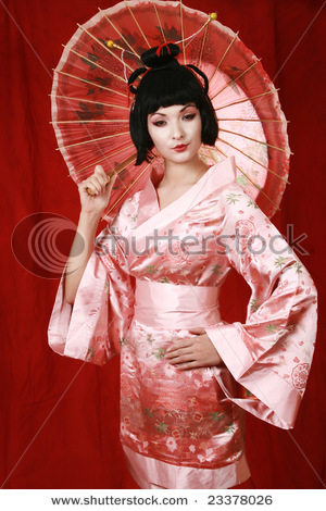 stock-photo-geisha-posing-isolated-on-red-23378026