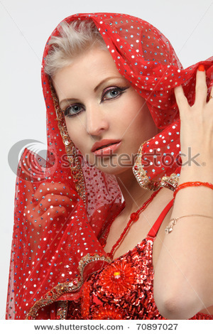 stock-photo-woman-with-a-weary-look-in-the-eastern-arabian-dress-70897027