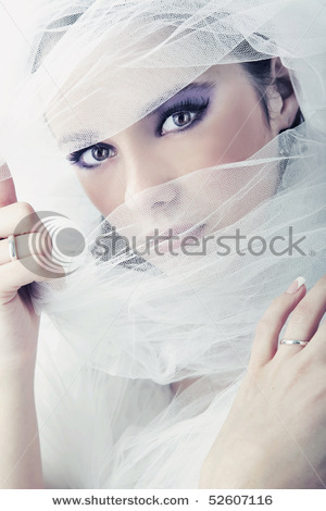 stock-photo-young-brunette-beauty-or-bride-behind-a-white-veil-52607116 - Araboaice1