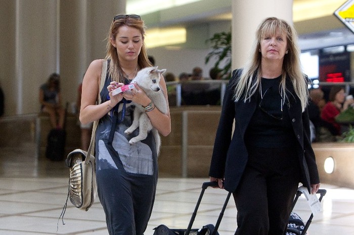 002 - 0-0At LAX Airport With Her New Puppy