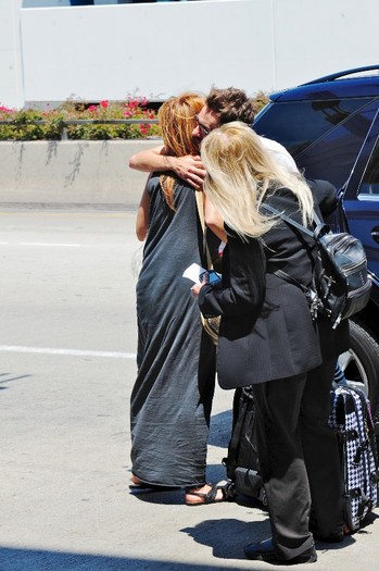 020 - 0-0At LAX Airport With Her New Puppy