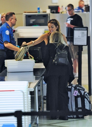 022 - 0-0At LAX Airport With Her New Puppy