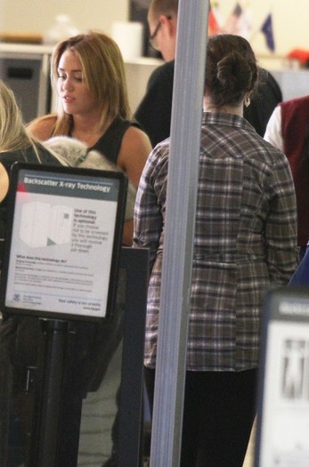049 - 0-0At LAX Airport With Her New Puppy