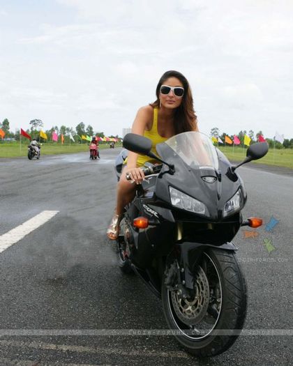 12690-hottie-kareena-sitting-on-a-bike