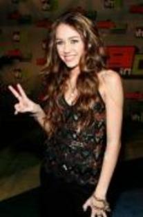 ENRHCUTQPIQPEPXMTCR - miley cyrus