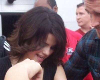 normal_06 - Selena Taking Pictures with Fans outside her Dallas - Texas