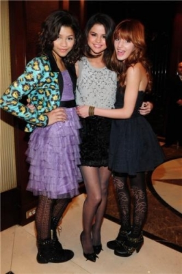 normal_011 - 15 03 2012 Taking photos in her Hotel after leaving it with Shake it up Stars