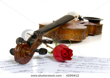 stock-photo-a-violin-red-rose-and-sheet-music-4299412