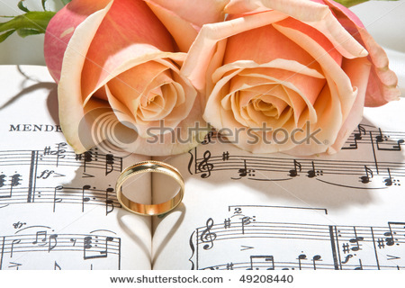 stock-photo-sheet-music-of-the-wedding-march-with-roses-and-rings-49208440 - Ceva special