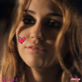 Sunt Miley Cyrus.Ma bucur.