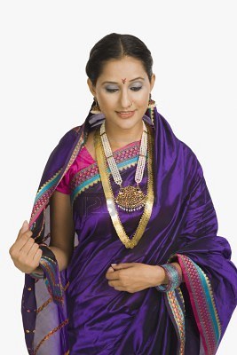 10169245-woman-wearing-jewelry-and-smiling - bindi indian