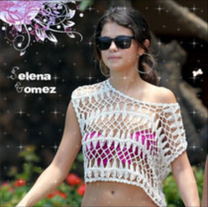 48335315_ZFWJOOUTM - cat de mult o yuby pe selena gomez si justin bieber