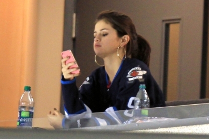 normal_033~5 - xX_Justin and Selena Watching Jets vs Hurricanes Game