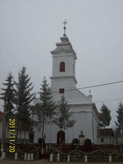 BISERICA DIN PALOS ZUGRAVITA PROASPAT PE EXTERIOR CU LAVABIL IN ANUL 2011.(fotografie facuta intr-o 