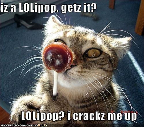 650x1600_funny_pictures_cat_and_lollipop[1]