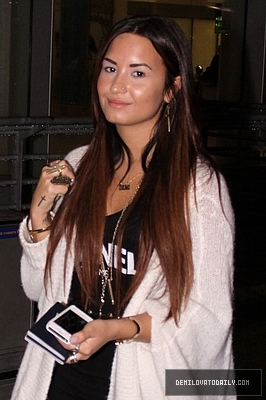 Demz (2) - Demi - October 12 - Arrives at Pearson International Airport in Toronto Canada