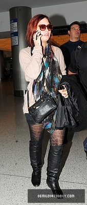 Demi (14) - Demi - December 10 - Arrives at the Miami International Airport